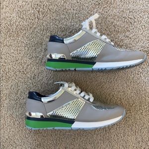 Michael Kors Women’s silver Sneakers size US 8